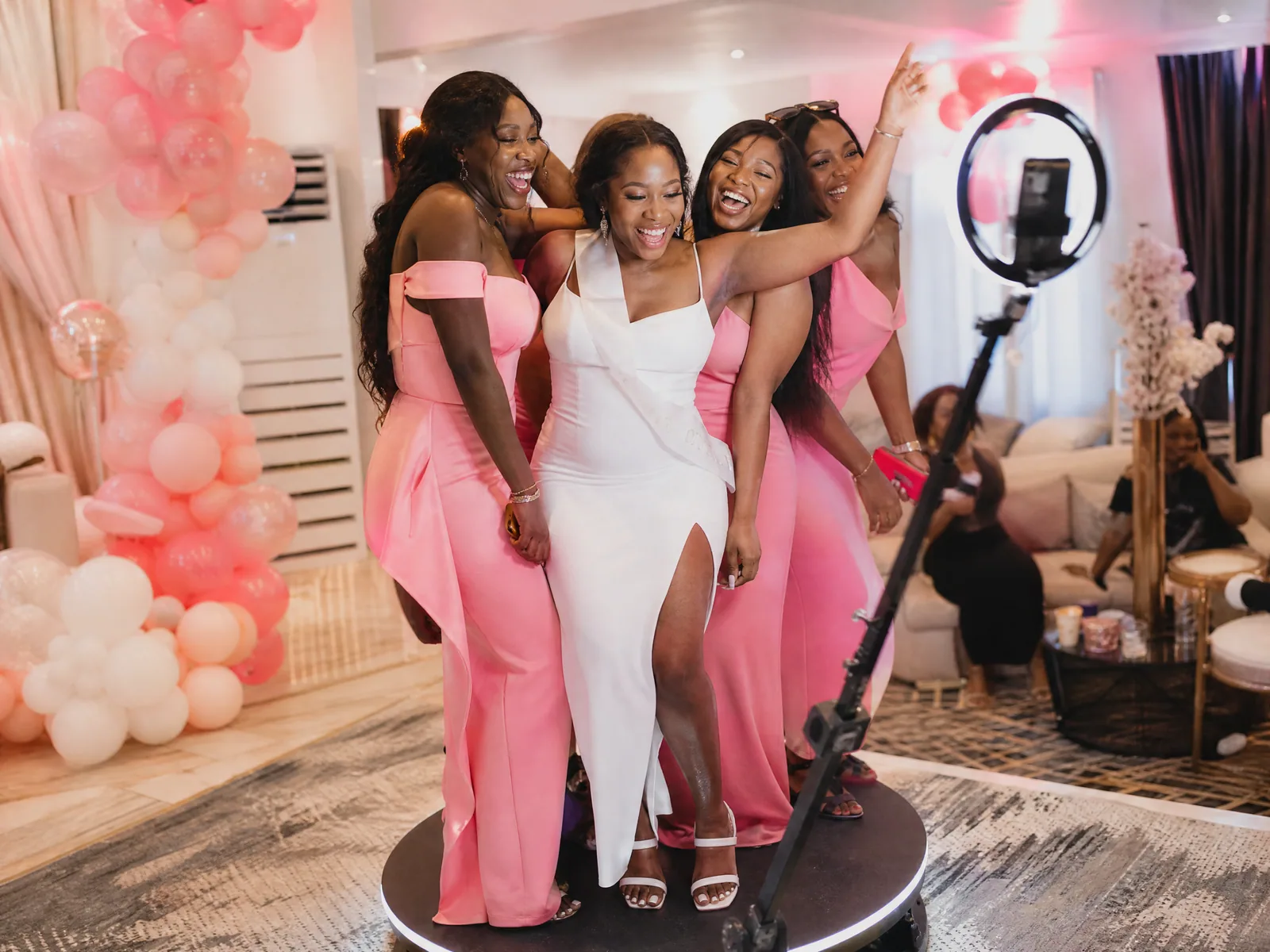 Engagement & Bridal Shower Booth with guests in Freetown