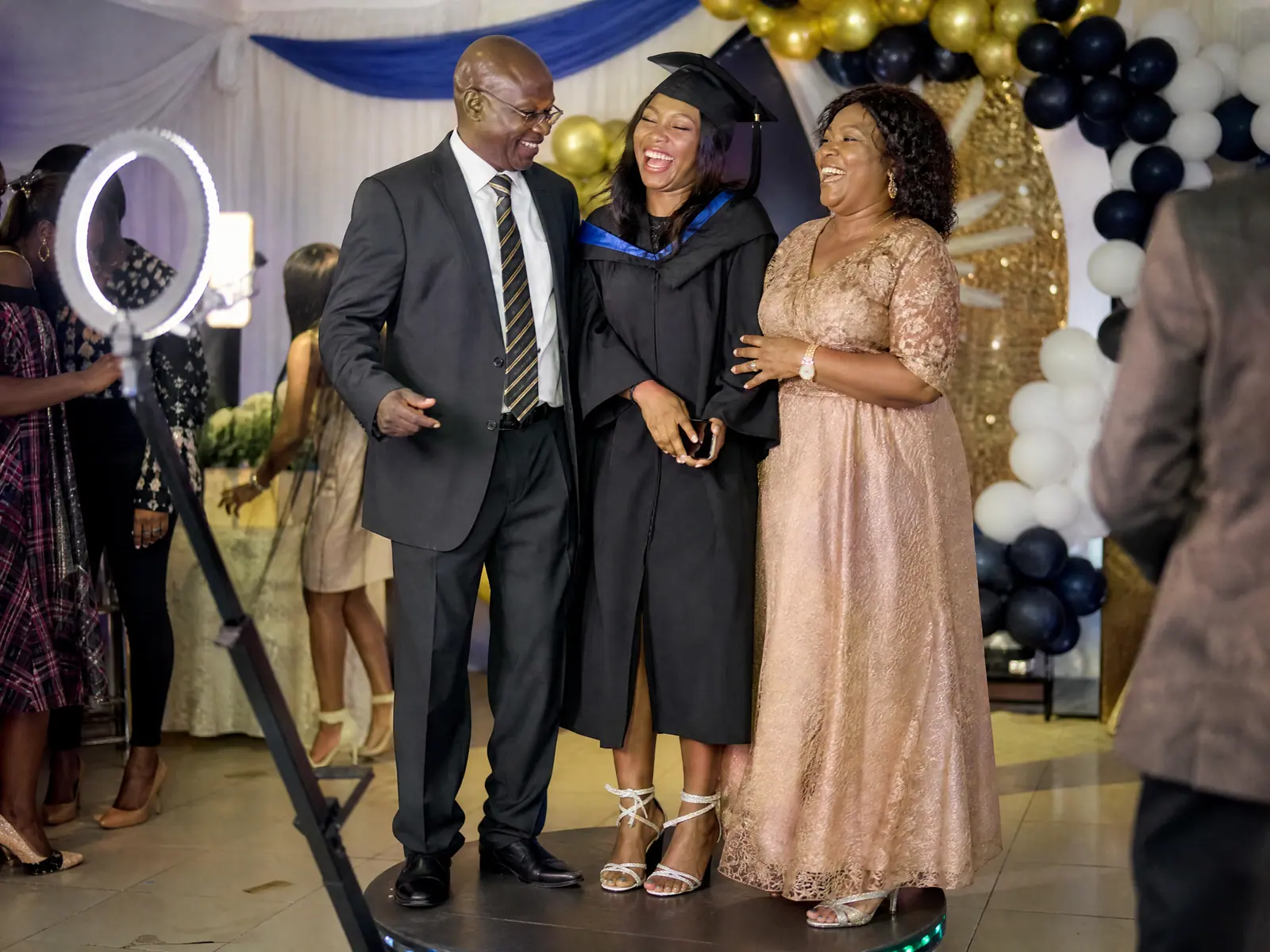 Graduation Party Booth with guests in Freetown